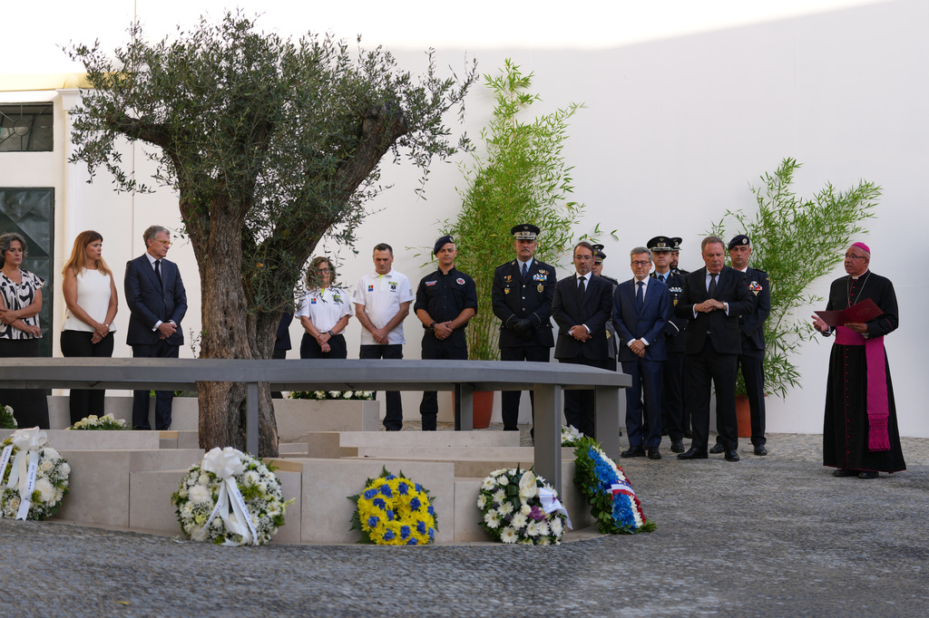Religious, military and political officials attend the inauguration of a memorial to the 16 people killed in the derailment and crash of Lisbon's Glória funicular, an iconic streetcar, on the first anniversary of the accident, Thursday, Sept. 3, 2026. (AP Photo/Armando Franca)