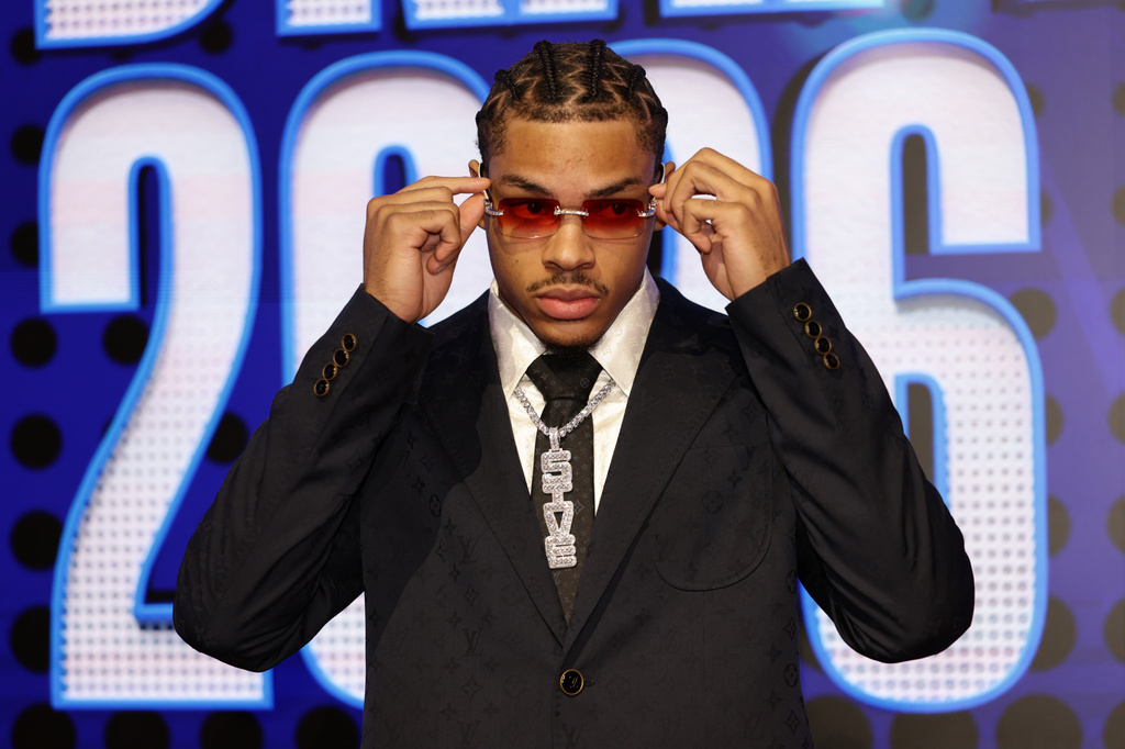 Darius Acuff Jr. arrives for the first round of the NBA basketball draft Tuesday, June 23, 2026, in New York. (AP Photo/Adam Hunger)