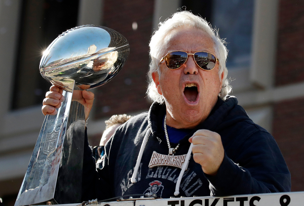 FILE - New England Patriots owner Robert Kraft yells to fans during their victory parade through downtown Boston, Feb. 5, 2019, to celebrate their win over the Los Angeles Rams in Sunday's NFL Super Bowl 53 football game in Atlanta. (AP Photo/Elise Amendola, File)