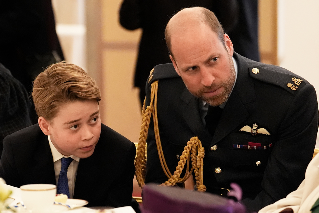 FILE - Prince William and Prince George join Second World War veterans at a tea party in Buckingham Palace, central London, Monday, May 5, 2025. (Jordan Pettitt/Pool Photo via AP, File)
