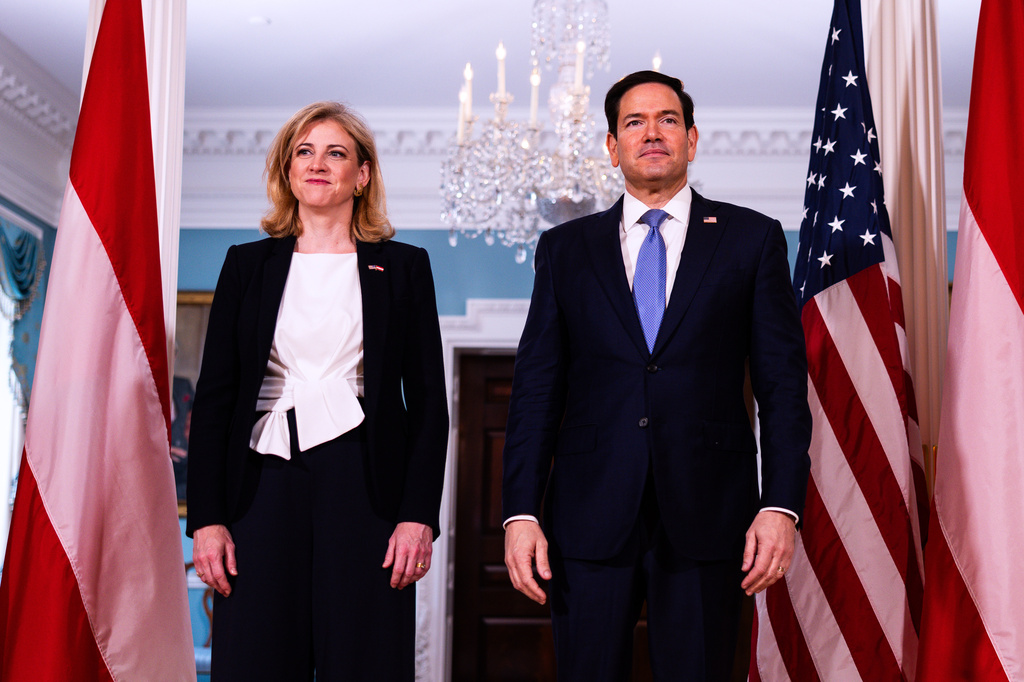 Secretary of State Marco Rubio arrives with Austrian Foreign Minister Beate Meinl-Reisinger, to the Treaty Room at the State Department, Tuesday, Aug. 11, 2026, in Washington. (AP Photo/Tierney L. Cross)