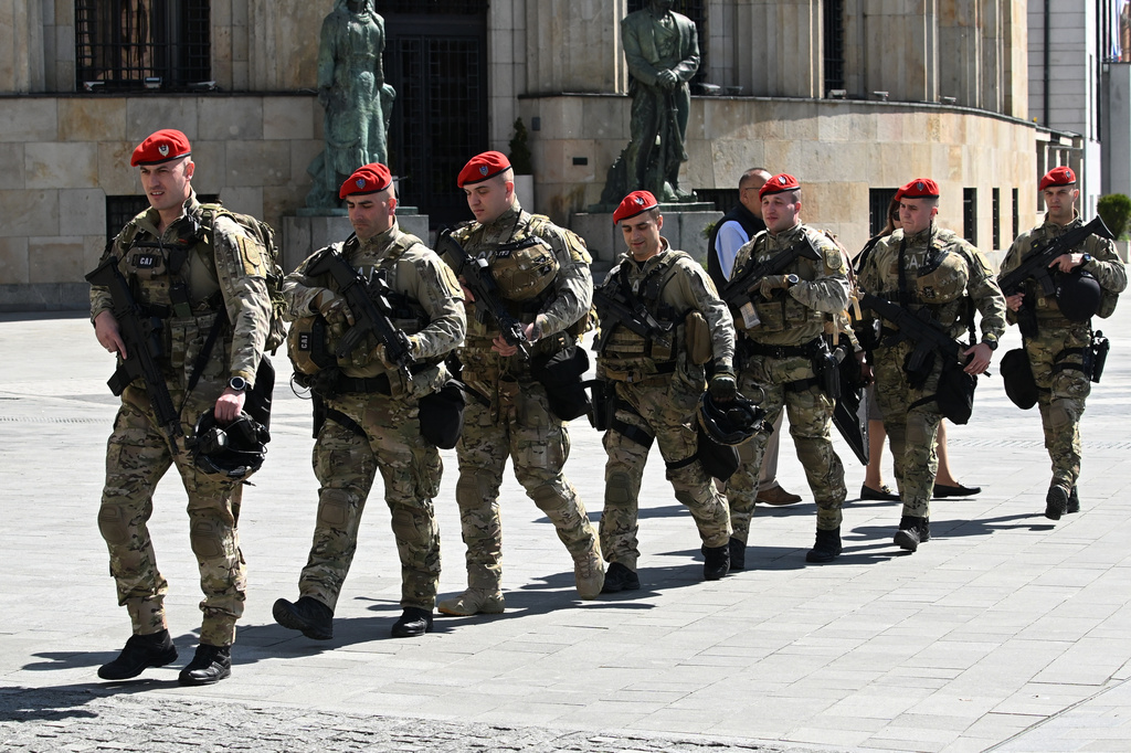 Police guard the Palace of the Republic prior visit of Donald Trump Jr. and meetings with representatives of the authorities of the Republika Srpska, in Banja Luka, Bosnia, Tuesday, April 7, 2026. (AP Photo/Radivoje Pavicic)