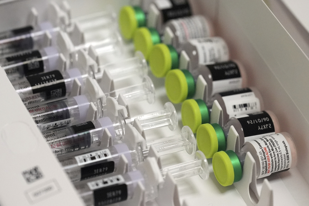 FILE - Doses of the measles, mumps, and rubella vaccine (MMR) are displayed in a box at a CVS Pharmacy, Tuesday, Sept. 9, 2025, in Miami. (AP Photo/Rebecca Blackwell, File)