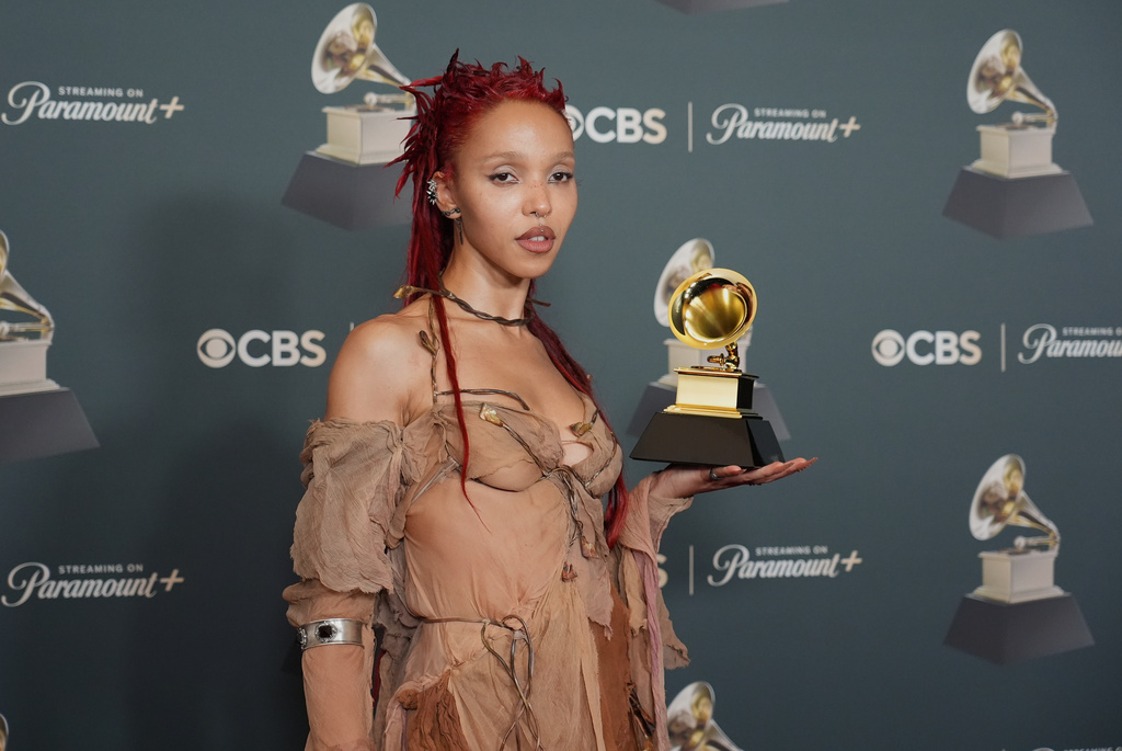 FKA Twigs poses in the press room with the award for best dance/electronic album for "EUSEXUA" during the 68th annual Grammy Awards on Sunday, Feb. 1, 2026, in Los Angeles. (Photo by Richard Shotwell/Invision/AP)