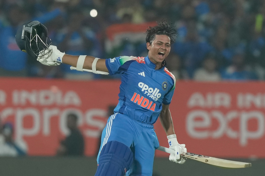 India's Yashasvi Jaiswal celebrates his century during the third One Day International cricket match between India and South Africa in Visakhapatnam, India, Saturday, Dec. 6, 2025. (AP Photo/Mahesh Kumar A.)
