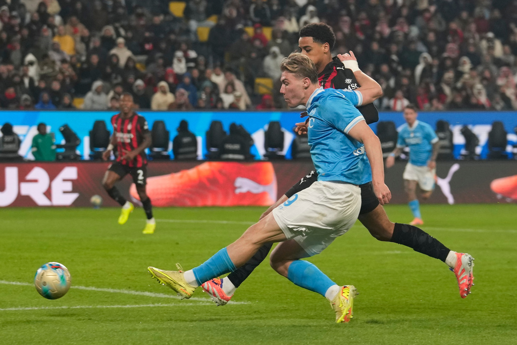 Napoli's Rasmus Hojlund scores his side's second goal during an Italian Super Cup soccer match between Napoli and AC Milan in Riyadh, Saudi Arabia, Thursday, Dec. 18, 2025. (AP Photo/Altaf Qadri)