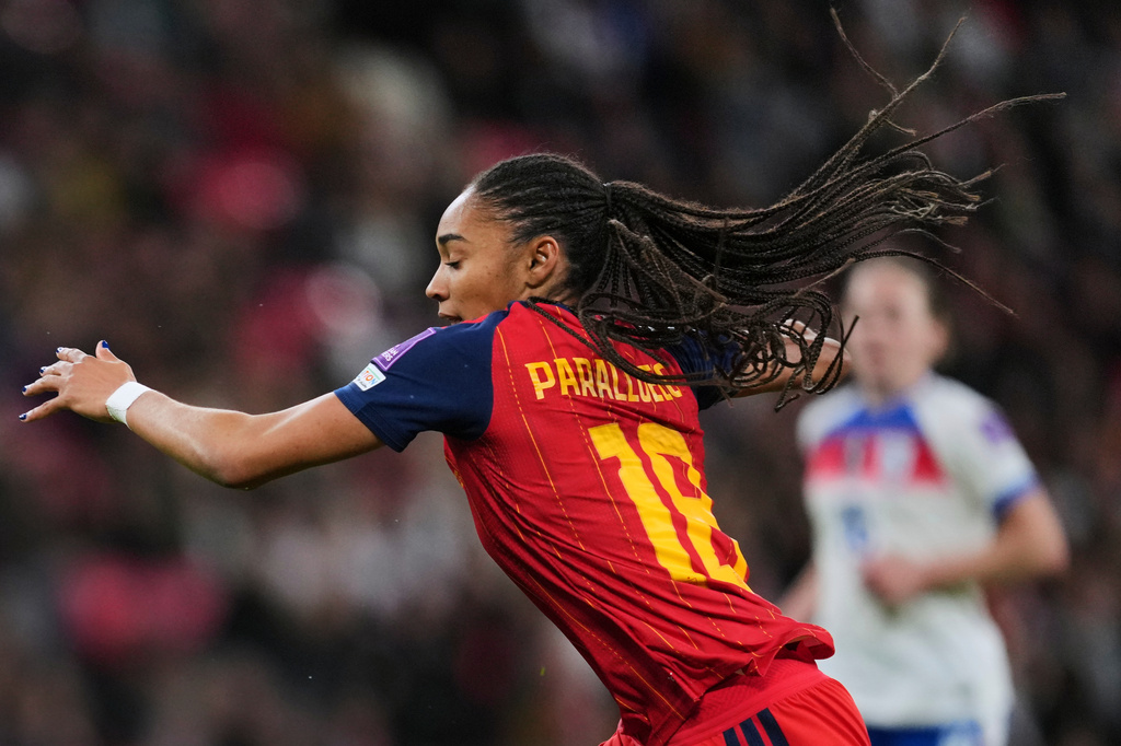 Spain's Salma Paralluelo runs with the ball during the Women's 2027 World Cup group C qualifier soccer match between England and Spain in London, Tuesday, April 14, 2026. (AP Photo/Kin Cheung)
