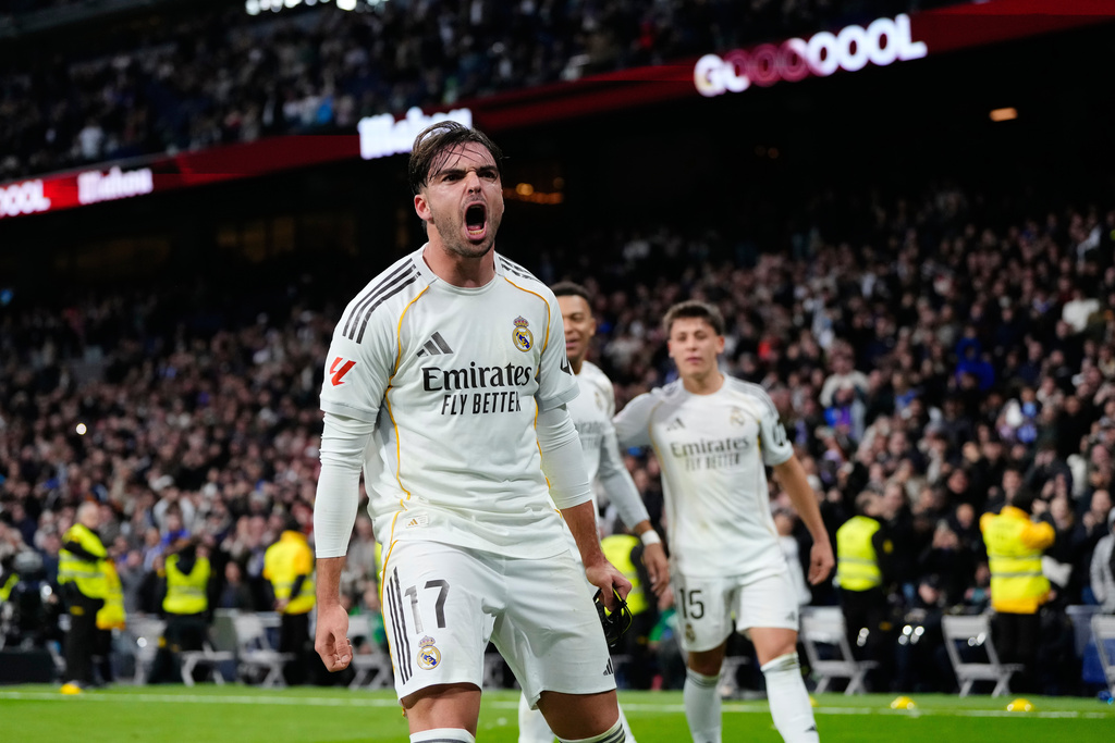 Real Madrid's Raul Asencio celebrates after scoring his side's second goal during the Spanish La Liga soccer match between Real Madrid and Levante in Madrid, Spain, Saturday, Jan. 17, 2026. (AP Photo/Jose Breton)