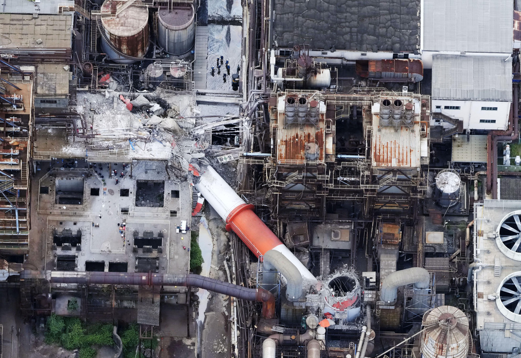This aerial image shows a damaged chimney of the Nippon Paper Industries Co.’s Yatsushiro factory, following an earthquake in Yatsushiro, Kumamoto Prefecture, Wednesday, July 29, 2026. (Naoki Hiraoka/Kyodo News via AP)