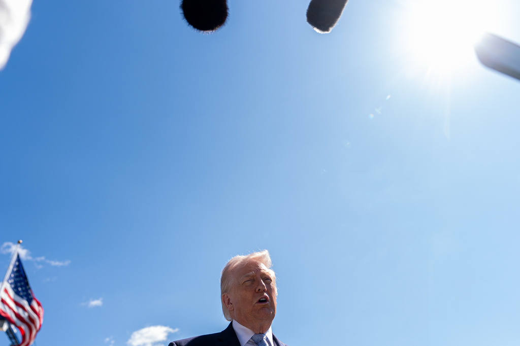 President Donald Trump speaks with reporters during the White House Easter Egg Roll on the South Lawn of the White House, Monday, April 6, 2026, in Washington. (AP Photo/Julia Demaree Nikhinson)