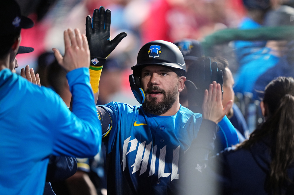 Philadelphia Phillies' Kyle Schwarber celebrates his home run off of Colorado Rockies pitcher Chase Dollander during the sixth inning of a baseball game, Friday, May 8, 2026, in Philadelphia. (AP Photo/Matt Rourke)