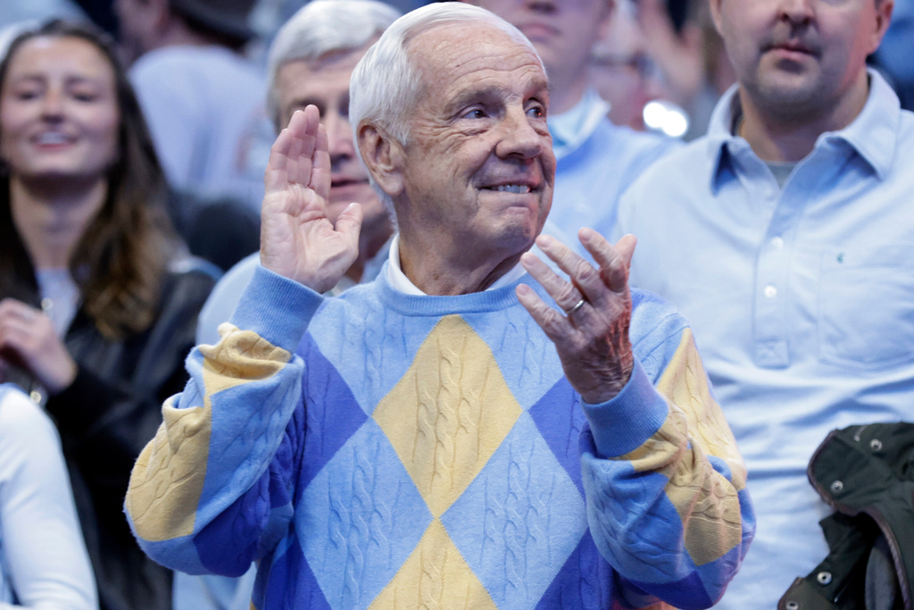 Former North Carolina head coach Roy Williams celebrates after the team defeated Duke with a basket in the final seconds of an NCAA college basketball game Saturday, Feb. 7, 2026, in Chapel Hill, N.C. (AP Photo/Chris Seward)