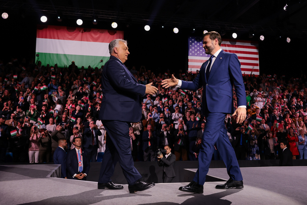 U.S. Vice President JD Vance and Hungarian Prime Minister Viktor Orban, left, shake hands during a Day of Friendship event in Budapest, Hungary Tuesday, April 7, 2026. (Jonathan Ernst/Pool Photo via AP)