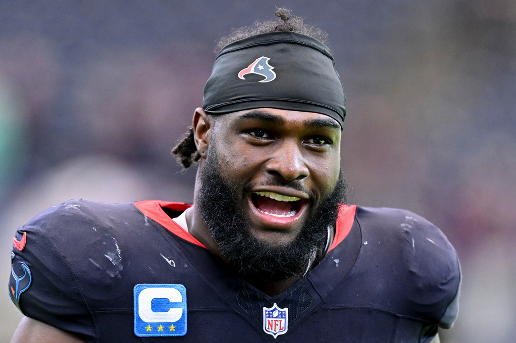 FILE - Houston Texans defensive end Will Anderson Jr. (51) walks on the field after an NFL football game against the Indianapolis Colts Sunday, Jan. 4, 2026, in Houston. (AP Photo/Maria Lysaker, File)