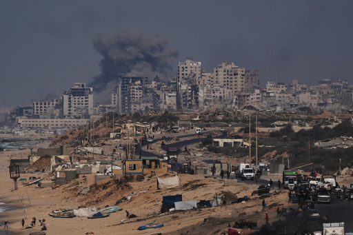 FILE - Smoke rises following an Israeli military strike in Gaza City, as seen from the central Gaza Strip, Friday, Sept. 26, 2025. (AP Photo/Abdel Kareem Hana, file) FILE - Smoke rises following an Israeli military strike in Gaza City, as seen from the central Gaza Strip, Friday, Sept. 26, 2025. (AP Photo/Abdel Kareem Hana, file)