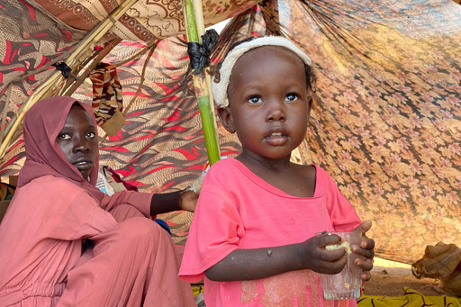 Nabaa Ahmed, 3, an injured Sudanese who fled el-Fasher city, after Sudan's paramilitary forces killed hundreds of people in the western Darfur region, receives medical care at a camp in Tawila, Sudan, Thursday, Oct. 30, 2025. (AP Photo/Mohammed Abaker) Nabaa Ahmed, 3, an injured Sudanese who fled el-Fasher city, after Sudan's paramilitary forces killed hundreds of people in the western Darfur region, receives medical care at a camp in Tawila, Sudan, Thursday, Oct. 30, 2025. (AP Photo/Mohammed Abaker)