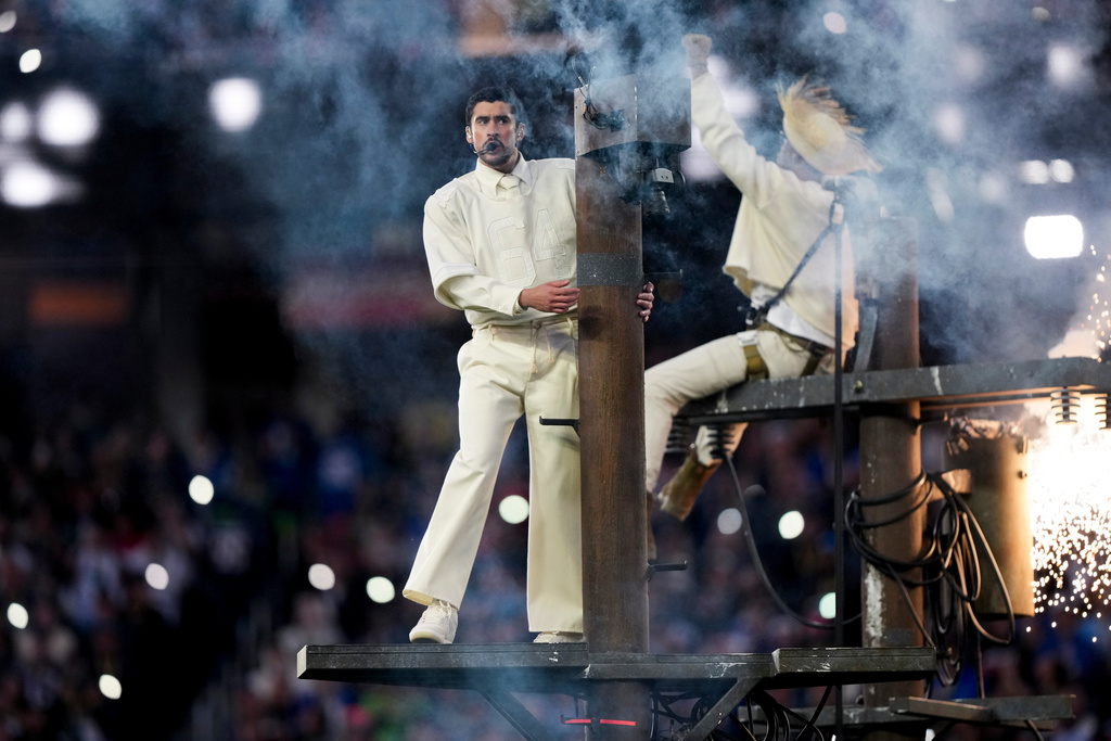 Bad Bunny performs during halftime of the NFL Super Bowl 60 football game between the New England Patriots and the Seattle Seahawks, Sunday, Feb. 8, 2026, in Santa Clara, Calif. (AP Photo/Brynn Anderson)