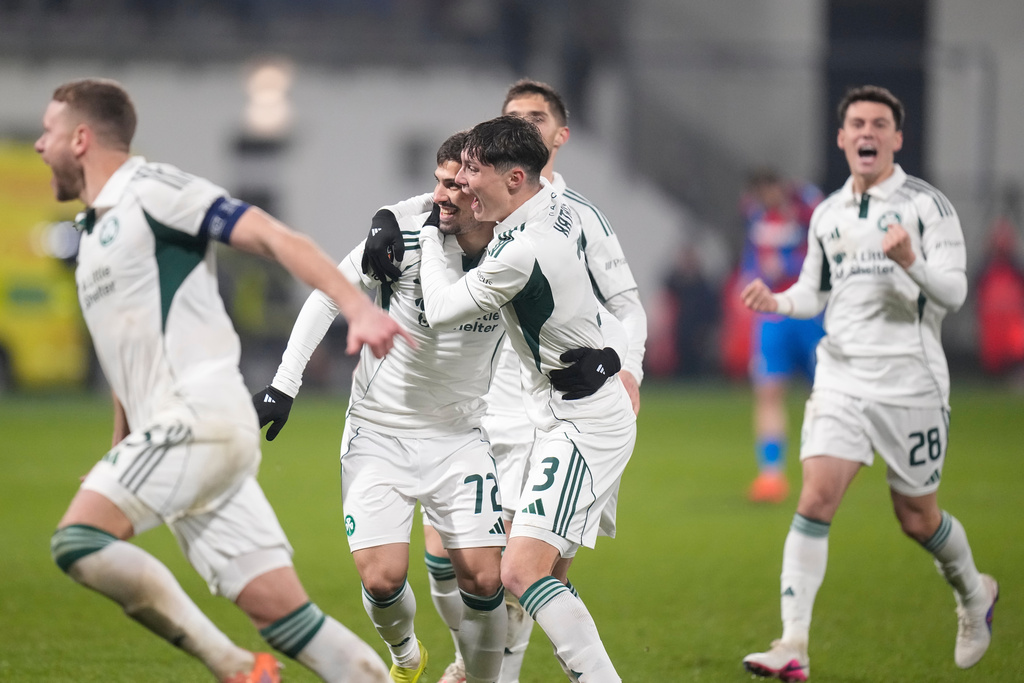 Panathinaikos' Milos Pantovic, 2nd left, celebrates with teammates after scoring a winning penalty in the Europa League playoff soccer match between Viktoria Plzen and Panathinaikos in Plzen, Czech Republic, Thursday, Feb. 26, 2026. (AP Photo/Petr David Josek)