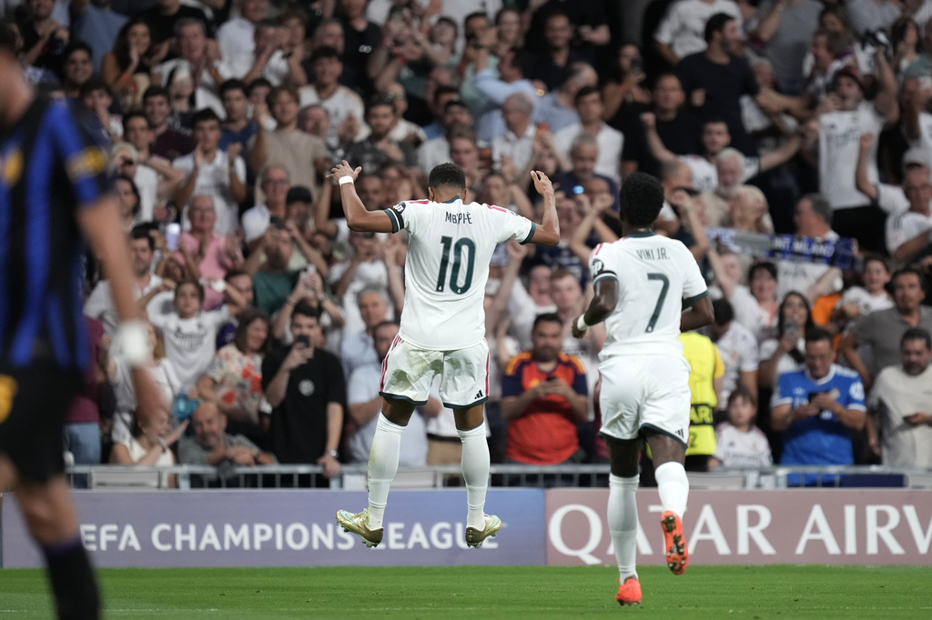 Real Madrid's Kylian Mbappe celebrates the opening goal, during a Champions League soccer match between Real Madrid and Inter Milan in Madrid, Spain, Tuesday, Sept. 8, 2026. (AP Photo/Bernat Armangue)