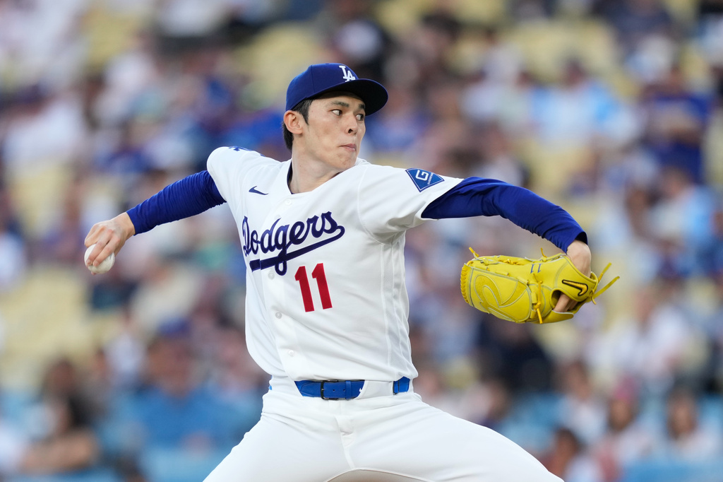 Los Angeles Dodgers starting pitcher Roki Sasaki throws to the plate during the first inning of a baseball game against the Seattle Mariners, Thursday, July 30, 2026, in Los Angeles. (AP Photo/Mark J. Terrill)
