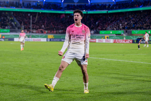 Leverkusen's Ibrahim Maza celebrates after scoring his side's third goal during a German soccer cup second round match between SC Paderborn and Bayer 04 Leverkusen in Paderborn, Germany, Wednesday, Oct. 29, 2025. (David Inderlied/dpa via AP) Leverkusen's Ibrahim Maza celebrates after scoring his side's third goal during a German soccer cup second round match between SC Paderborn and Bayer 04 Leverkusen in Paderborn, Germany, Wednesday, Oct. 29, 2025. (David Inderlied/dpa via AP)