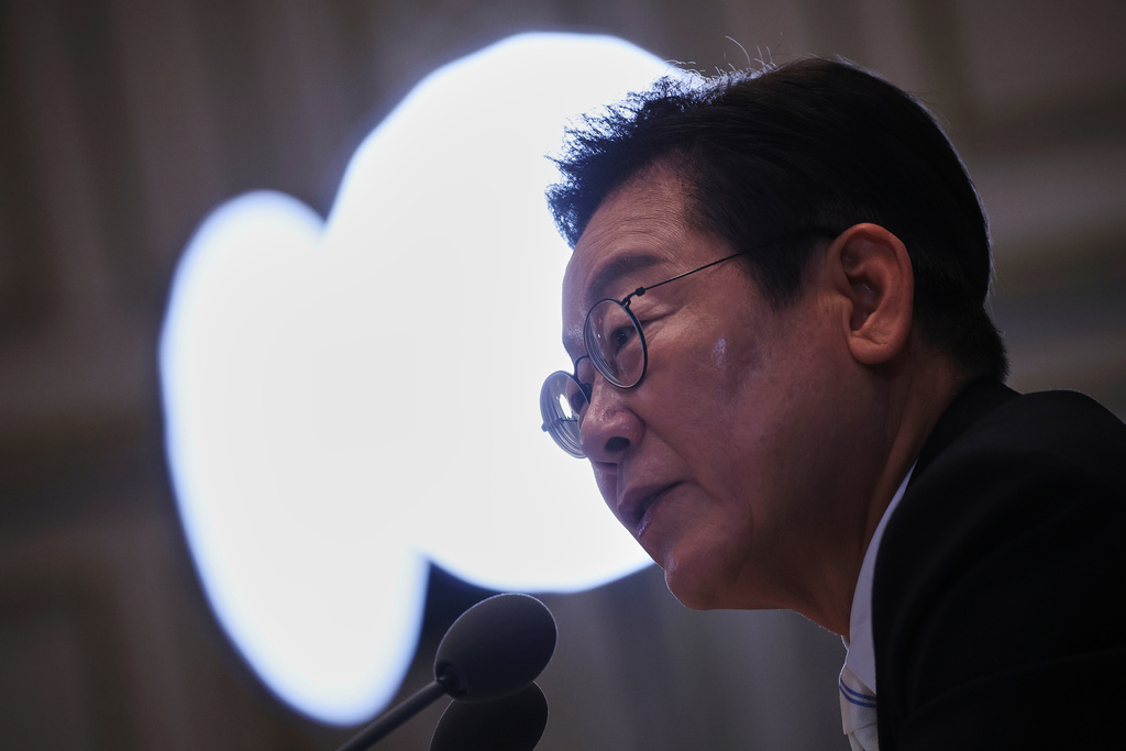 South Korean President Lee Jae Myung speaks during a news conference to mark 100 days in office at the Blue House in Seoul, South Korea, Sept, 11, 2025. (Kim Hong-Ji/Pool Photo via AP)