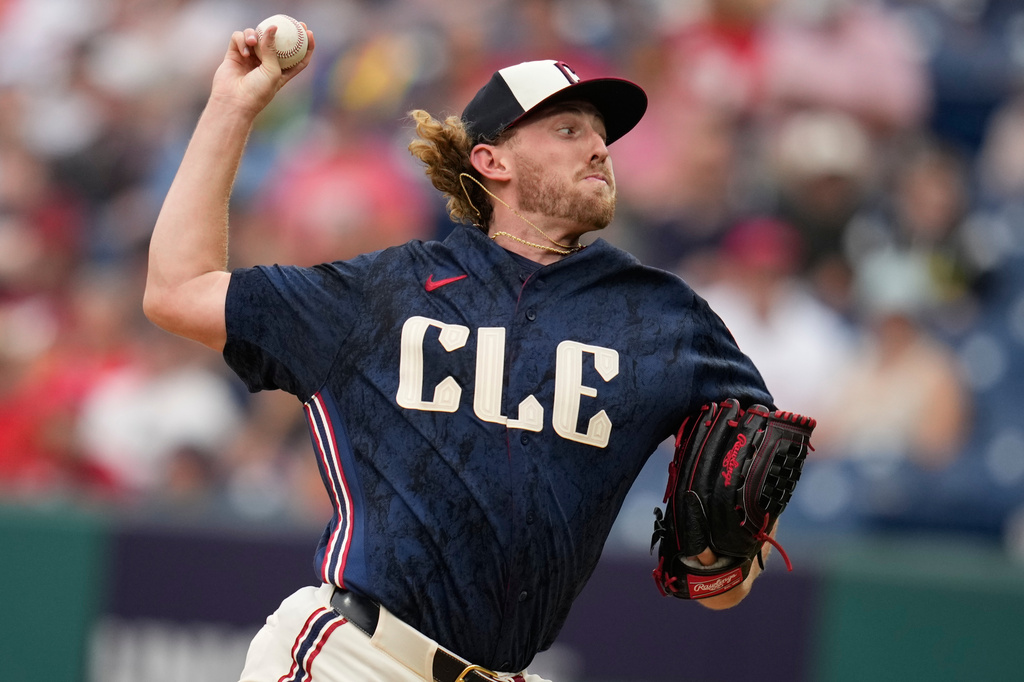 Cleveland Guardians' Tanner Bibee pitches in the first inning of a baseball game against the Arizona Diamondbacks in Cleveland, Friday, July 31, 2026. (AP Photo/Sue Ogrocki)