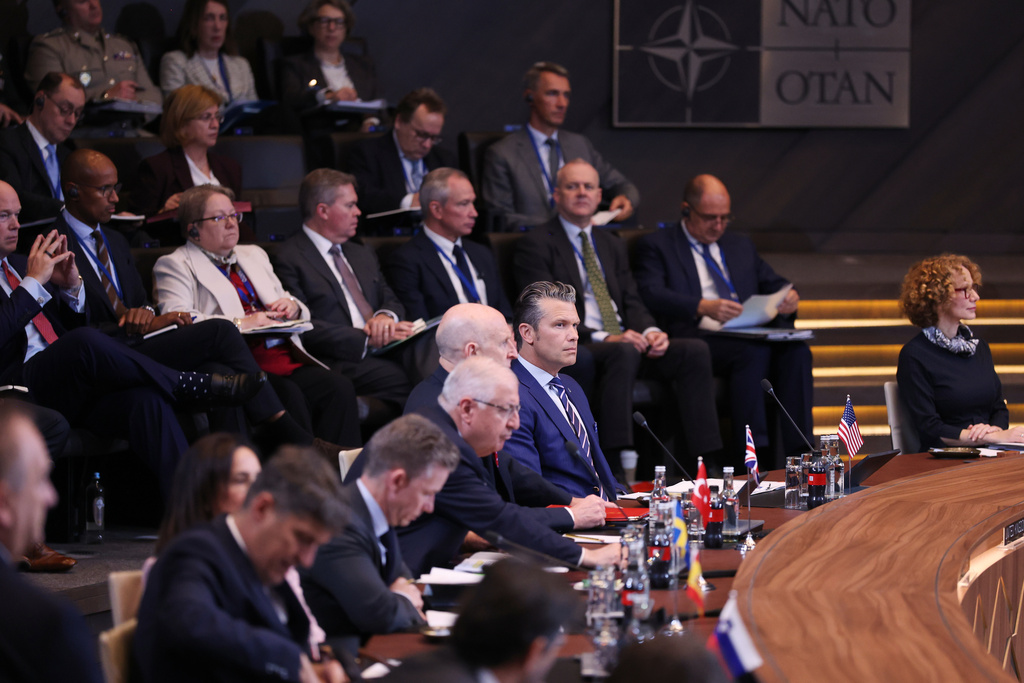 United States Defense Secretary Pete Hegseth, front second right, attends a meeting of the North Atlantic Council in defense ministers format at NATO headquarters in Brussels, Wednesday, Oct. 15, 2025 (AP Photo/Omar Havana)