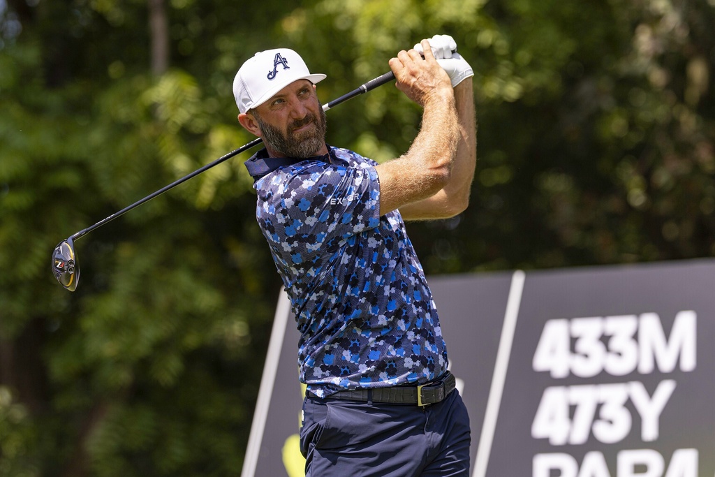 Captain Dustin Johnson, of 4Aces GC, hits from the ninth tee during the final round of LIV Golf Indianapolis at The Club at Chatham Hills, Sunday, Aug. 17, 2025, in Westfield, Ind. (Scott Taetsch/LIV Golf via AP)