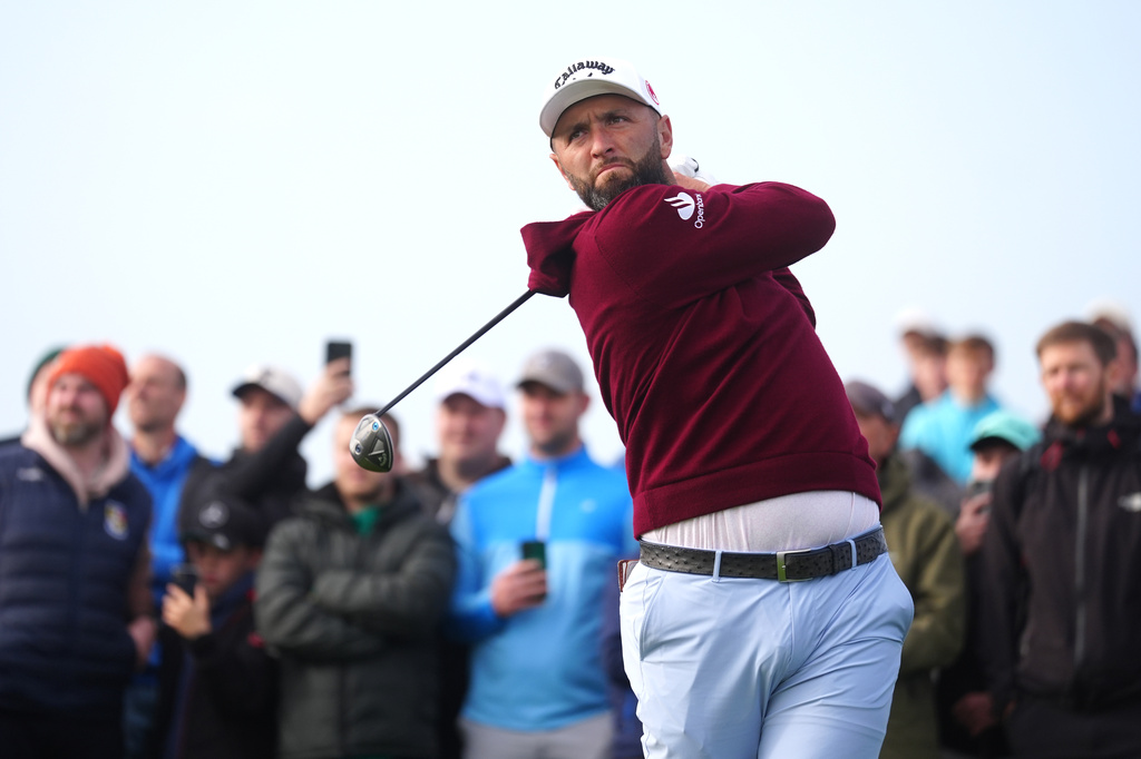 Jon Rahm of Spain tees off the 2nd on day two of the Irish Open at Trump International Golf Links in Doonbeg, Ireland, Friday Sept. 11, 2026. (Brian Lawless/PA via AP)