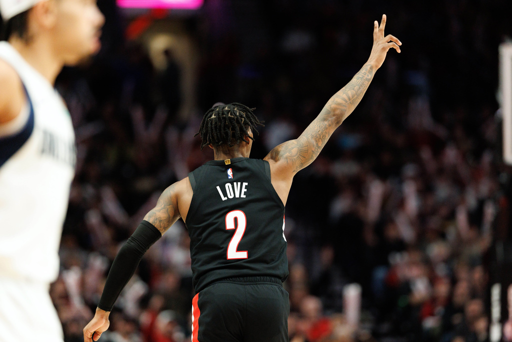 Portland Trail Blazers guard Caleb Love celebrates after scoring during the second half of an NBA basketball game against the Dallas Mavericks Monday Dec. 29, 2025, in Portland, Ore. (AP Photo/Howard Lao)
