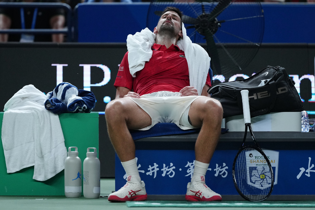 Novak Djokovic of Serbia reacts during the men's singles match against Jaume Munar of Spain, in the Shanghai Masters tennis tournament at Qizhong Forest Sports City Tennis Center, in Shanghai, China, Tuesday, Oct. 7, 2025. (AP Photo/Andy Wong)