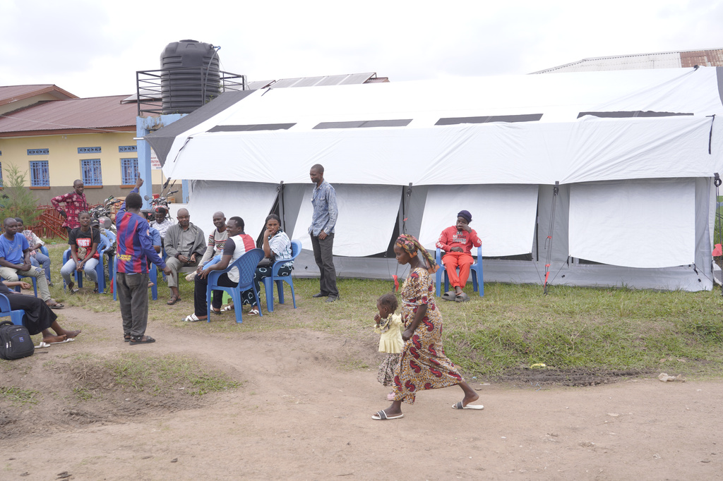 Workers at an Ebola treatment center go on strike over unpaid salaries and bonuses at Rwampara General Hospital, in Ituri, northeastern Congo, Monday, July 13, 2026, (AP Photo/Dirole Lotsima Dieudonne)