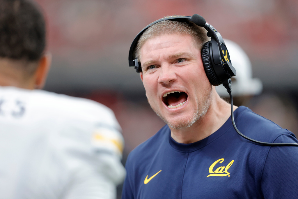 California head coach Tosh Lupoi gives instructions to a player during the second half of an NCAA college football game against UNLV, Saturday, Oct. 3, 2026, in Las Vegas. (Steve Marcus/Las Vegas Sun via AP)