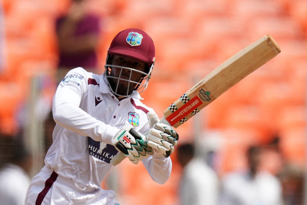 West Indies' Alick Athanaze plays a shot on the third day of the first Test cricket match between India and West Indies at Narendra Modi Stadium in Ahmedabad, India, Saturday, Oct. 4, 2025. (AP Photo/Ajit Solanki)