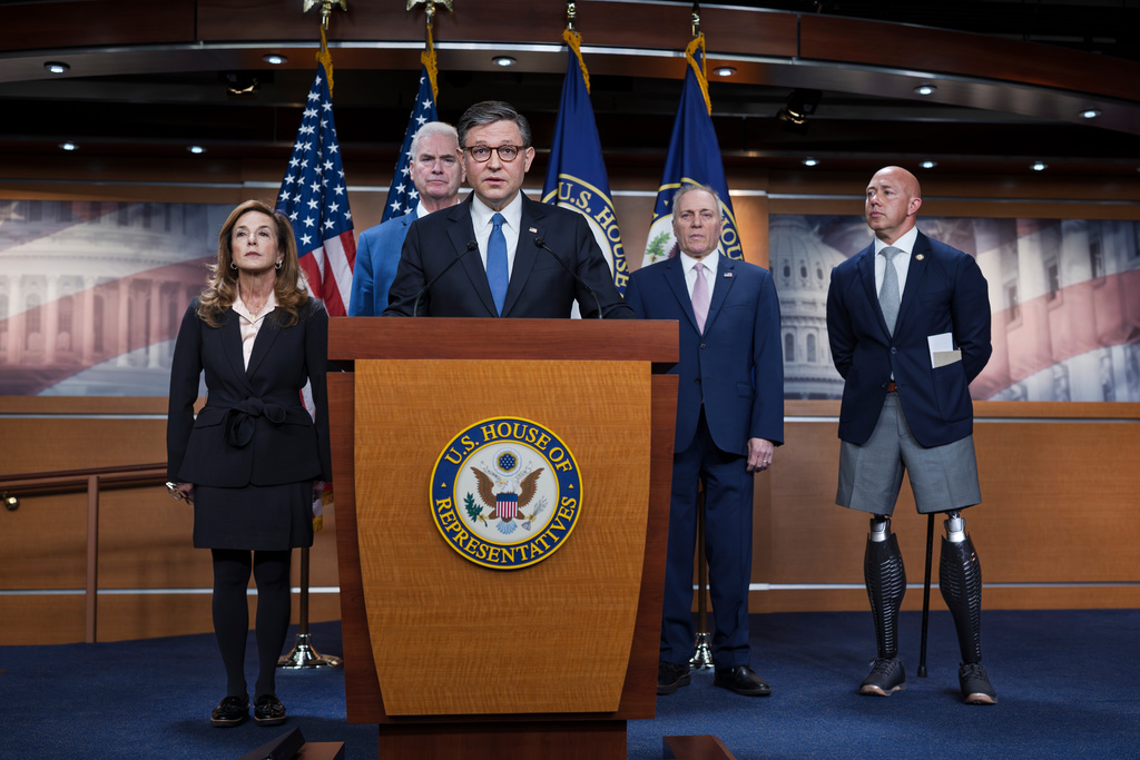 Speaker of the House Mike Johnson, R-La., joined from left by Rep. Lisa McClain, R-Mich., Majority Whip Tom Emmer, R-Minn., Majority Leader Steve Scalise, R-La., and Rep. Brian Mast, R-Fla., chairman of the House Foreign Affairs Committee, talk about the war against Iran, during a news conference at the Capitol in Washington, Wednesday, March 4, 2026. (AP Photo/J. Scott Applewhite)