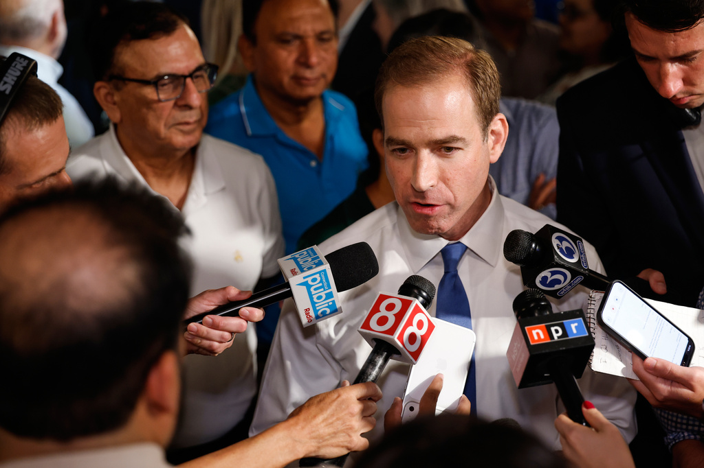 Luke Bronin, former Hartford mayor and Democratic candidate for Connecticut's 1st congressional district, speaks during an election night watch party Tuesday, Aug. 11, 2026, in Hartford, Conn. (AP Photo/Rusty Jones)
