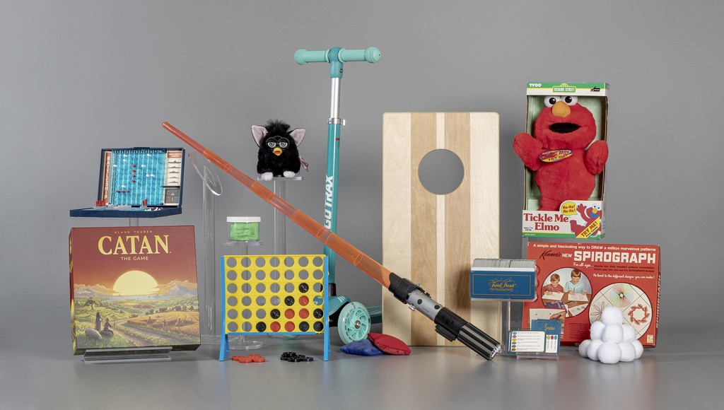 The Strong's National Toy Hall of Fame in Rochester, N.Y., on Sept. 17, 2025, announced the 12 finalists in the running for induction later this year: Battleship, Catan, Connect Four, cornhole, Furby, scooter, slime, snow, Spirograph, Star Wars Light Saber, Tickle Me Elmo, and Trivial Pursuit. (Strong’s National Toy Hall of Fame via AP)
