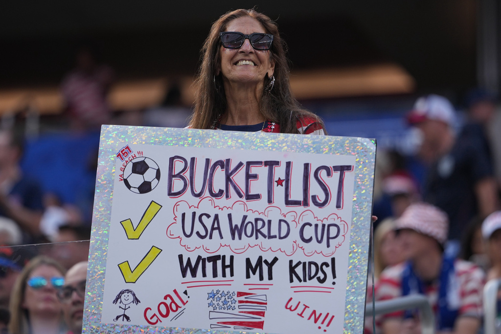A fan waits for the beginning of the World Cup Group D soccer match between the United States and Paraguay in Inglewood, Calif., near Los Angeles, Friday, June 12, 2026. (AP Photo/Jae C. Hong)