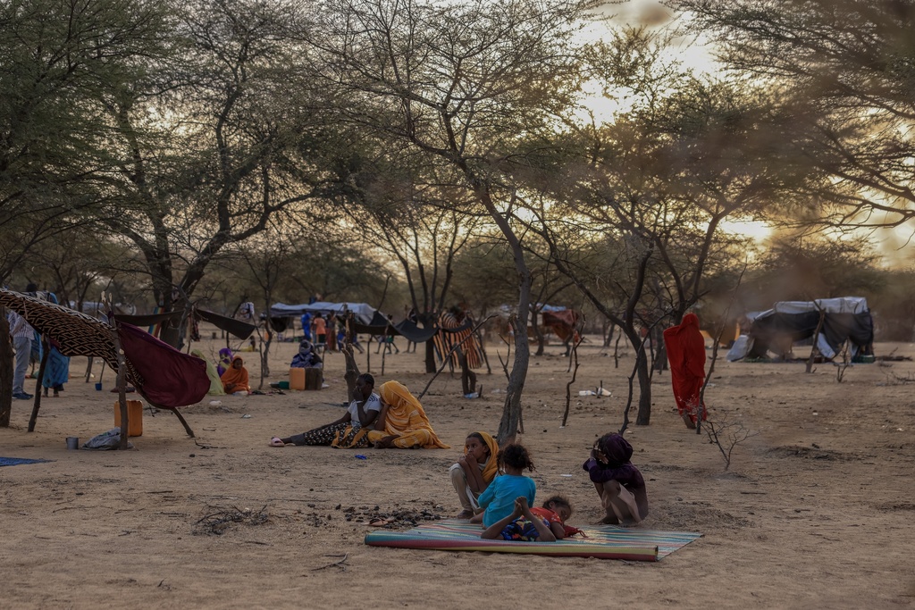 Malian refugees fleeing violence in Mali, sit in a makeshift camp where they found refuge in Douankara, Hodh El Chargui Region, Mauritania, Nov. 9 2025. (AP Photo/Caitlin Kelly)