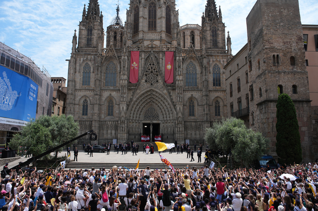 Pope Leo XIV looks at the cheering crowd upon arriving to attend a midday prayer at the Cathedral of the Holy Cross and Saint Eulalia in Barcelona, Spain, Tuesday, June 9, 2026. (AP Photo/Emilio Morenatti)