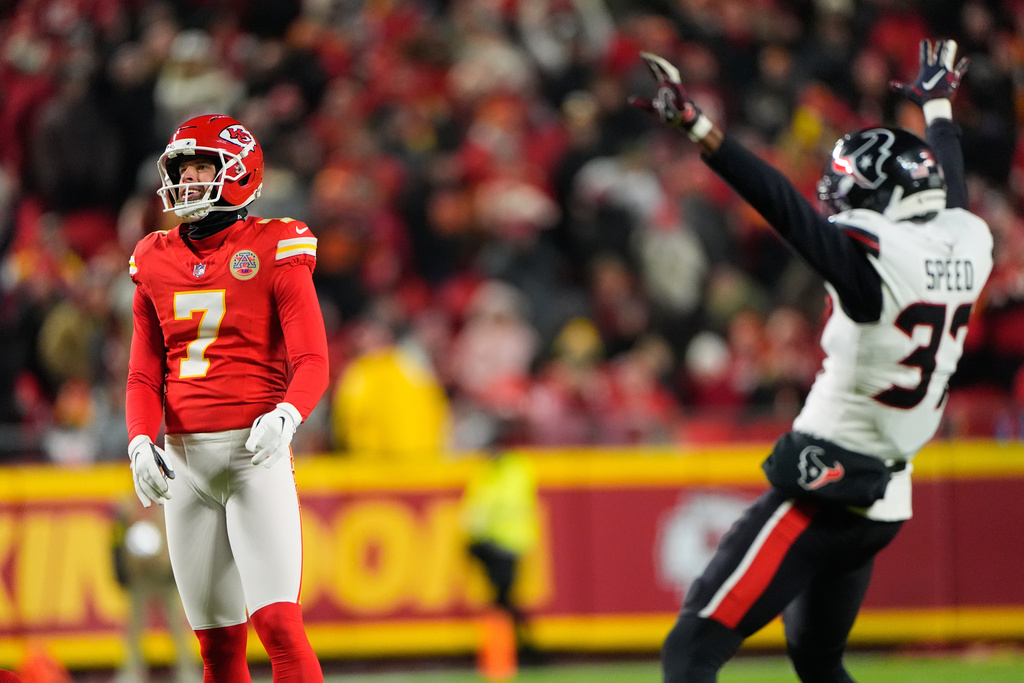 Houston Texans cornerback Ameer Speed (37) reacts to Kansas City Chiefs kicker Harrison Butker (7) missing a field goal attempt during the first half of an NFL football game Sunday, Dec. 7, 2025, in Kansas City, Mo. (AP Photo/Charlie Riedel)