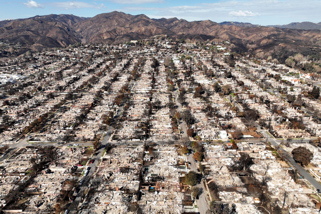 FILE - The devastation from the Palisades Fire is shown in an aerial view of the Pacific Palisades neighborhood of Los Angeles, Monday, Jan. 27, 2025. (AP Photo/Jae C. Hong, File)
