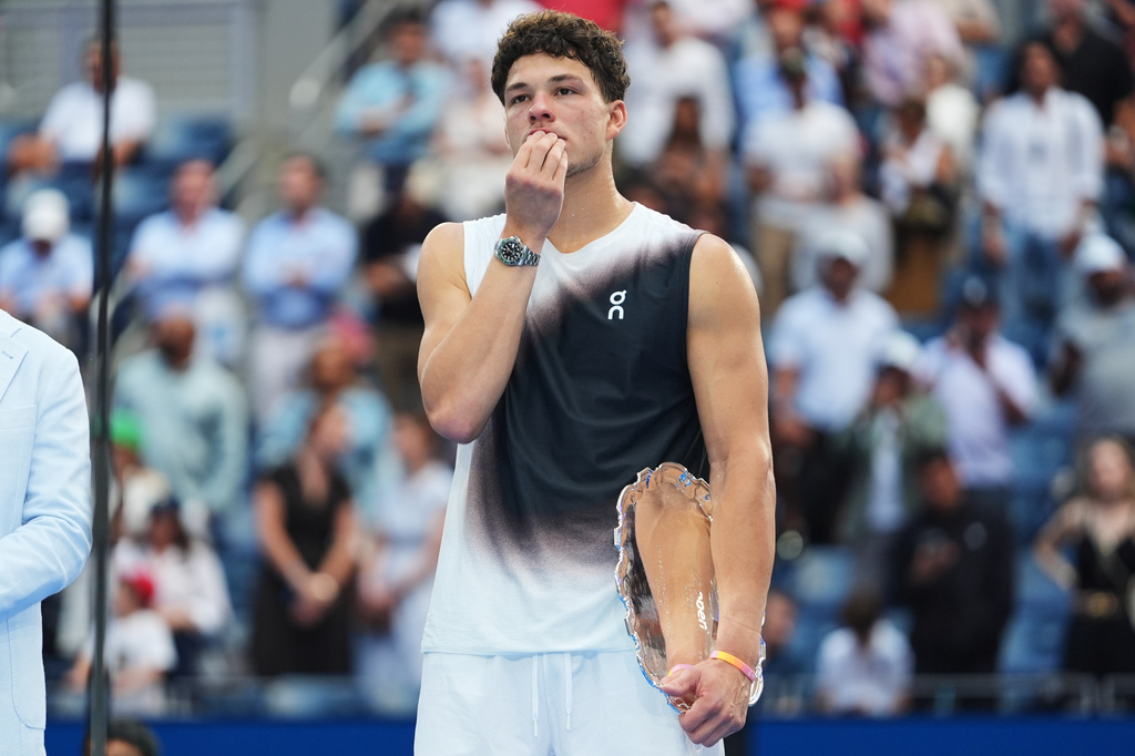 Ben Shelton, of the United States, looks on after his loss in the men's singles final of the U.S. Open tennis championships against Alexander Zverev, of Germany, Sunday, Sept. 13, 2026, in New York. (AP Photo/Frank Franklin II)