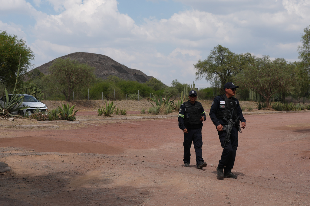 Police patrol the pyramids after authorities said a gunman opened fire in Teotihuacan, Mexico, Monday, April 20, 2026. (AP Photo/Eduardo Verdugo)