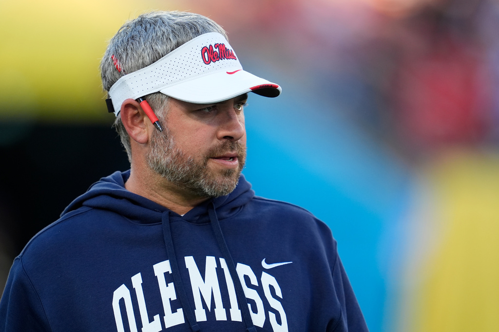 Mississippi head coach Pete Golding looks onto the field before an NCAA college football game against Louisville, Sunday, Sept. 6, 2026, in Nashville, Tenn. (AP Photo/George Walker IV)