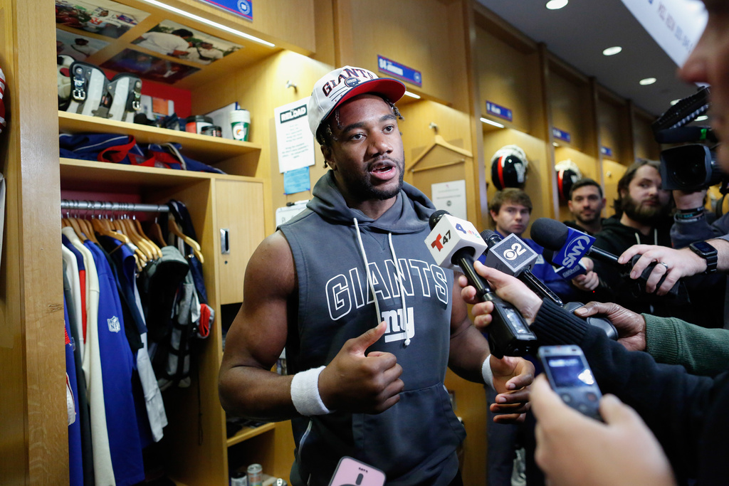 New York Giants line backer Bobby Okereke speaks to the media, Tuesday, Dec. 2, 2025, in East Rutherford, N.J. (AP Photo/Kena Betancur)