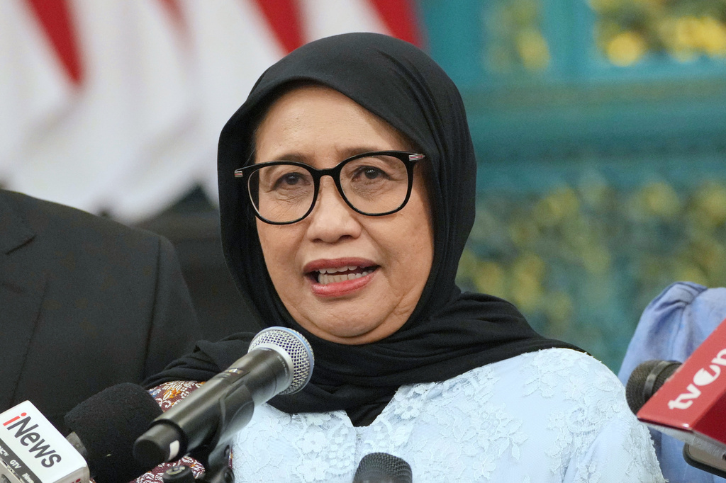 FILE - The head of Indonesia's National Nutrition Agency, Nanik Sudaryati Deyang, talks to journalists after her swearing-in ceremony at Merdeka Palace in Jakarta, Indonesia, Monday, June 8, 2026. (AP Photo/Achmad Ibrahim, File)