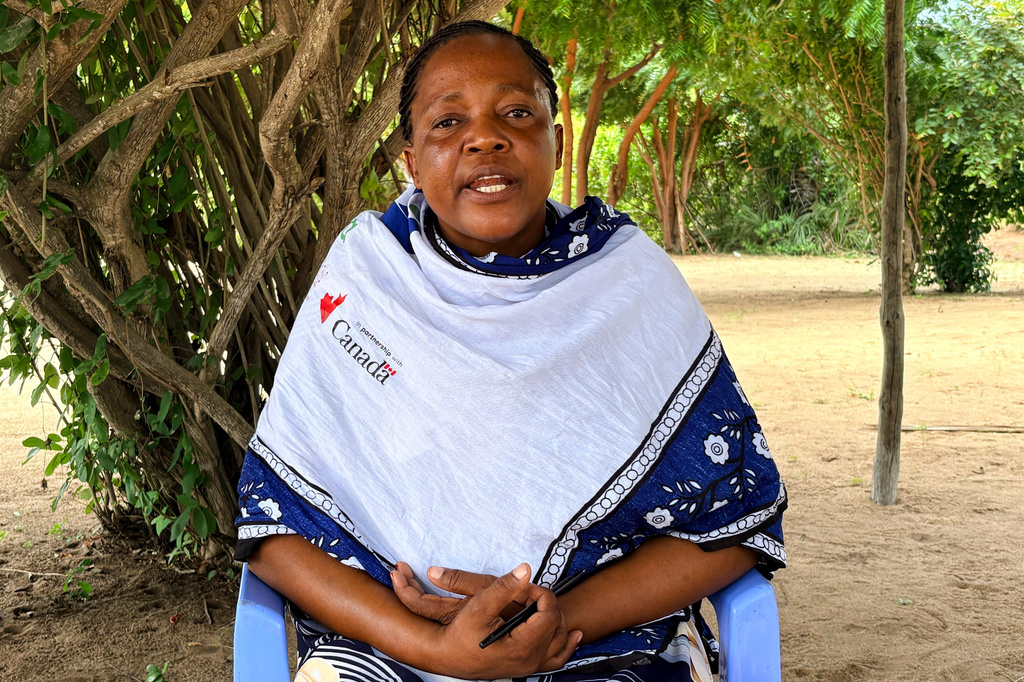 Beatrice Mwanyiro, chair of the Samito Women Group, is interviewed outside the group's unfinished restaurant and mangrove restoration center in Sabaki, Malindi, Kenya, on June 15, 2026. (AP Photo/Allan Olingo)