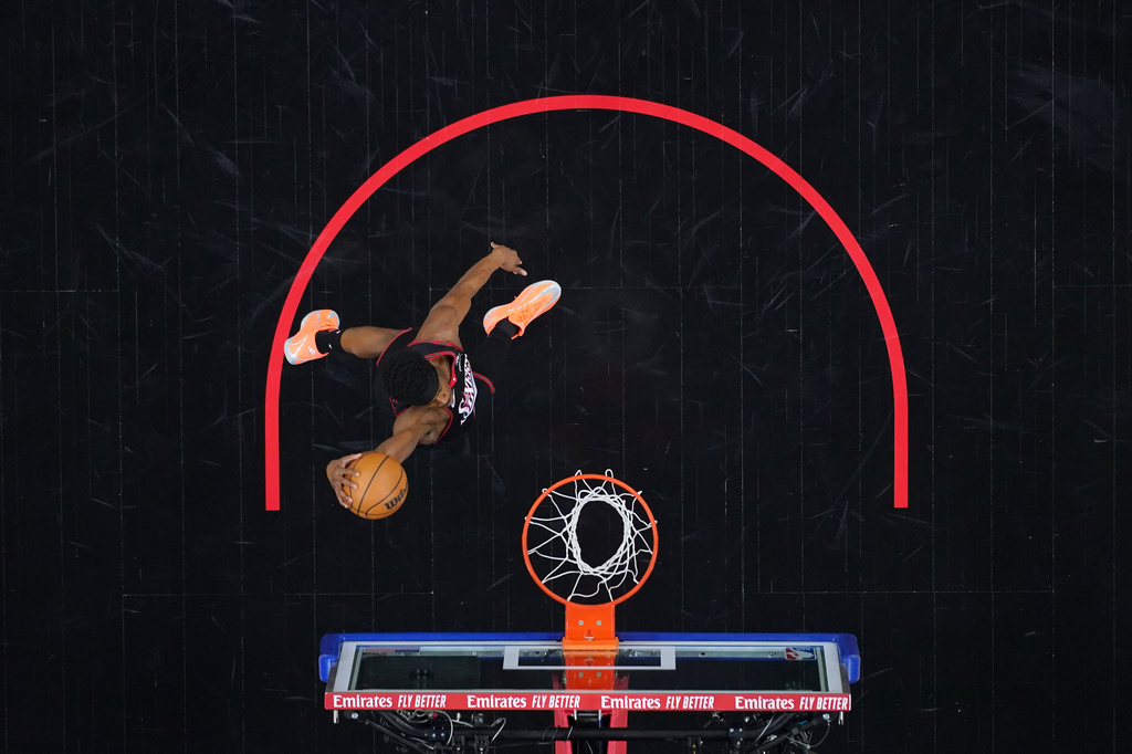 Philadelphia 76ers' VJ Edgecombe goes up for a dunk during the first half of Game 3 against the Boston Celtics in a first-round NBA playoffs basketball series Friday, April 24, 2026, in Philadelphia. (AP Photo/Matt Slocum)